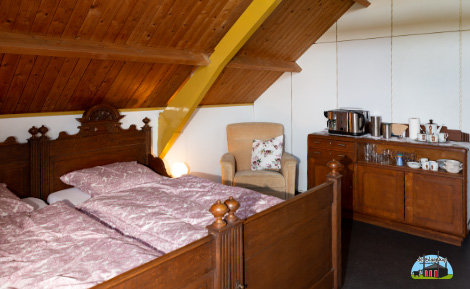 Slaapkamer van Bed and Breakfast de Blaarkop in Nieuw Wetering